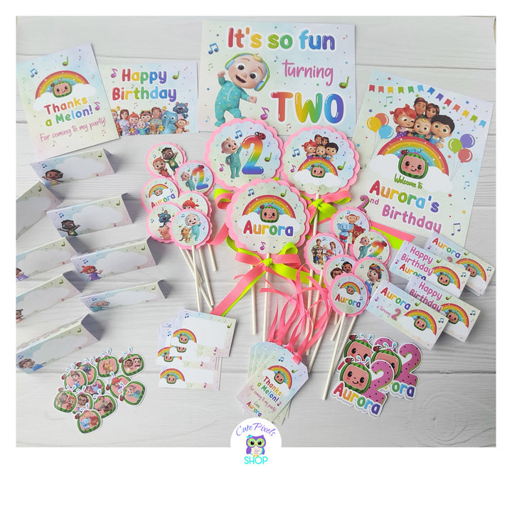Cocomelon Party Decorations fully assembled. Party in a box Cocomelon Party Package including Banner, Cupcake Toppers, Centerpieces, Thank You Tags, Place Cards, Birthday Signs, Favor Tags, Bag Toppers and stickers. All printed with a rainbow pattern and all Cocomelon characters.